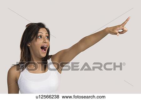 Woman pointing with finger View Large Photo Image Stock Photo - Woman pointing with finger. Fotosearch