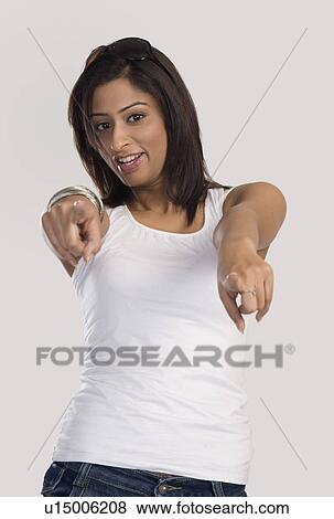Woman pointing with fingers View Large Photo Image Stock Photo - Woman pointing with fingers. Fotosearch