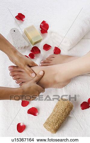 Woman receiving pedicure treatment at health spa View Large Photo Image Picture - Woman receiving pedicure treatment at health spa. Fotosearch