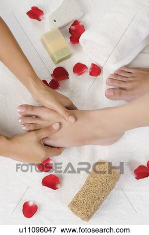 Woman receiving pedicure treatment at health spa View Large Photo Image Stock Photo - Woman receiving pedicure treatment at health spa. Fotosearch