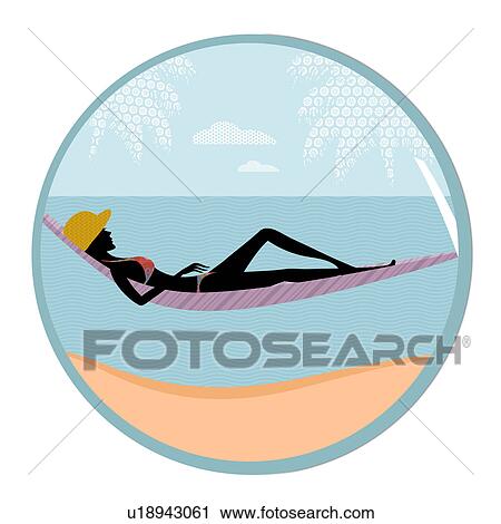 Stock Image - Woman resting in a hammock. Fotosearch
