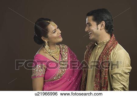 Woman talking to her son and smiling View Large Photo Image Stock Photograph - Woman talking to her son and smiling. Fotosearch