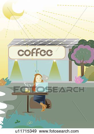 Stock Photo - Woman using solar charging laptop. Fotosearch