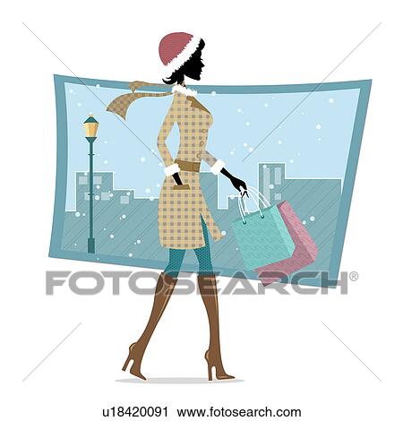 Stock Image - Woman walking with shopping bags during snowfall. Fotosearch
