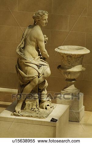 Stock Photography - Woman's statue in a museum, Musee du Louvre, Paris, France. Fotosearch