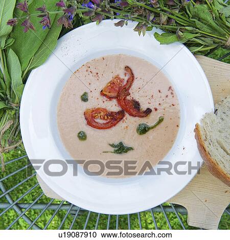 Bowl of butternut squash soup View Large Photo Image Stock Image - Bowl of butternut squash soup. Fotosearch