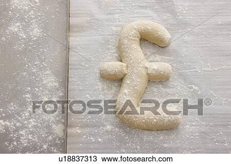 Bread dough shaped in pound symbol View Large Photo Image Stock Image - Bread dough shaped in pound symbol. Fotosearch