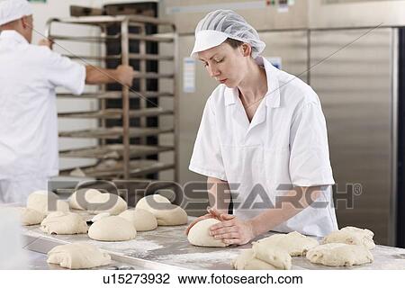 Chef baking in kitchen View Large Photo Image Stock Image - Chef baking in kitchen. Fotosearch