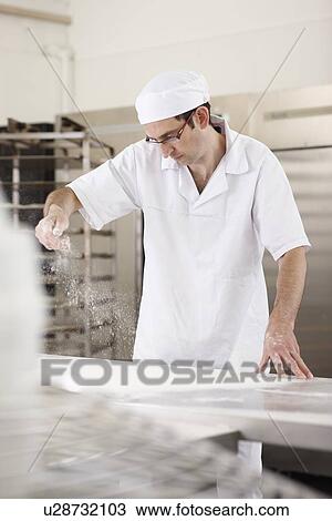 Chef baking in kitchen View Large Photo Image Stock Image - Chef baking in kitchen. Fotosearch