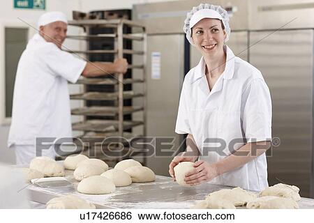 Chef baking in kitchen View Large Photo Image Stock Photograph - Chef baking in kitchen. Fotosearch