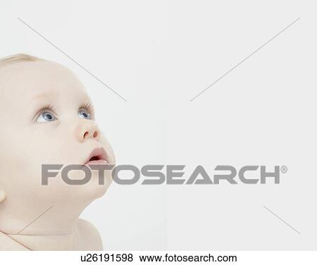 Stock Photo - Close up of baby boys face. Fotosearch