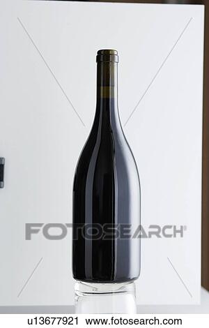 Close up of bottle of Bordeaux wine View Large Photo Image Stock Image - Close up of bottle of Bordeaux wine. Fotosearch