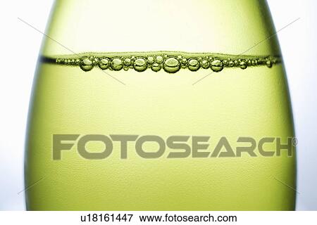 Close up of bubbles in bottle of wine View Large Photo Image Stock Photo - Close up of bubbles in bottle of wine. Fotosearch