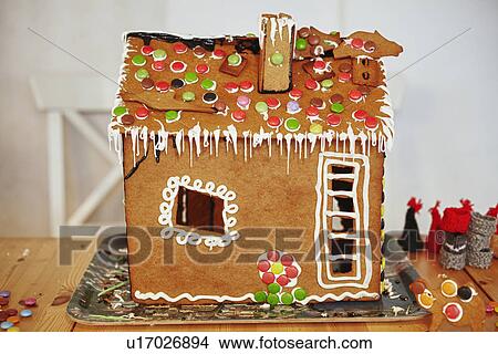Picture - Close up of decorated gingerbread house. Fotosearch