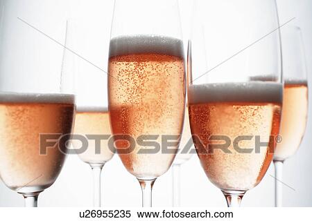 Close up of glasses of champagne View Large Photo Image Stock Photography - Close up of glasses of champagne. Fotosearch