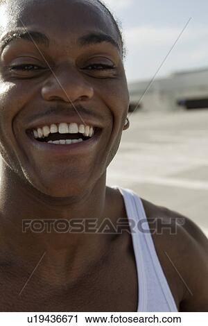 Close up of mans smiling face View Large Photo Image Stock Image - Close up of mans smiling face. Fotosearch
