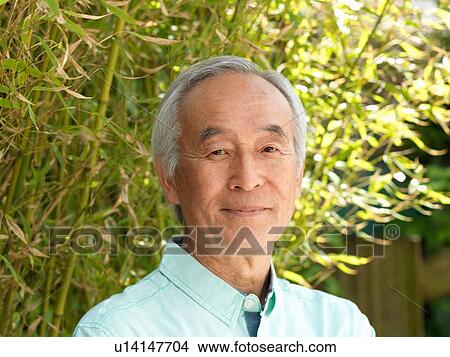 Picture - Close up of older mans smiling face. Fotosearch