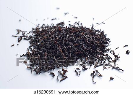 Close up of pile of tea leaves View Large Photo Image Stock Image - Close up of pile of tea leaves. Fotosearch