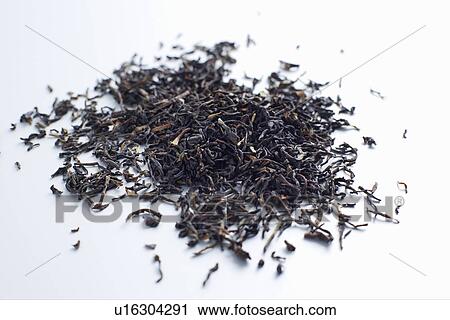 Stock Image - Close up of pile of tea leaves. Fotosearch