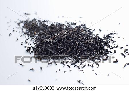 Stock Image - Close up of pile of tea leaves. Fotosearch