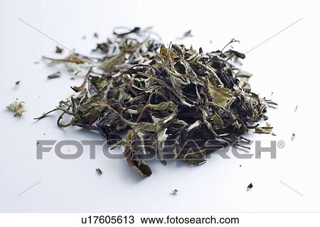 Stock Image - Close up of pile of tea leaves. Fotosearch