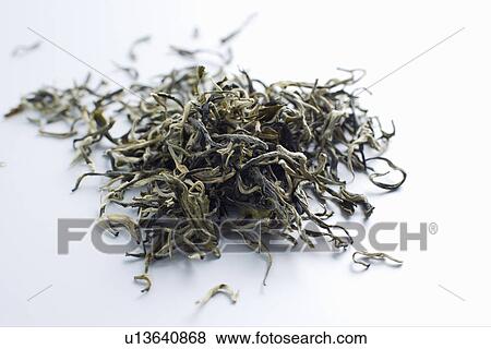 Stock Photo - Close up of pile of tea leaves. Fotosearch