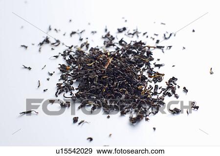 Close up of pile of tea leaves View Large Photo Image Stock Photo - Close up of pile of tea leaves. Fotosearch