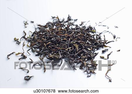Stock Photo - Close up of pile of tea leaves. Fotosearch