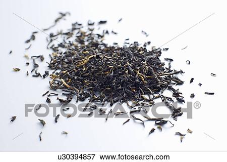 Close up of pile of tea leaves View Large Photo Image Stock Photo - Close up of pile of tea leaves. Fotosearch