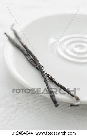 Close up of plate of vanilla beans View Large Photo Image Picture - Close up of plate of vanilla beans. Fotosearch