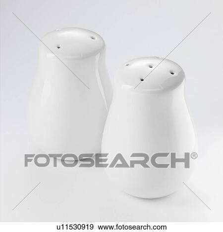 Close up of salt and pepper shakers View Large Photo Image Stock Photo - Close up of salt and pepper shakers. Fotosearch