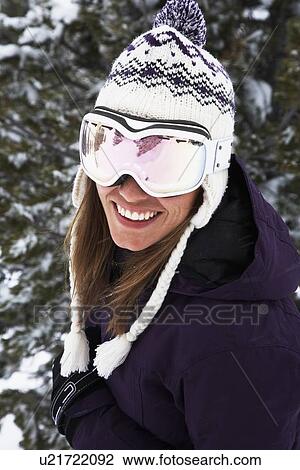 Close up of skier in goggles and hat View Large Photo Image Stock Image - Close up of skier in goggles and hat. Fotosearch
