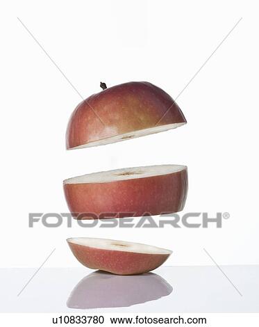 Stock Image - Close up of slices of apple. Fotosearch