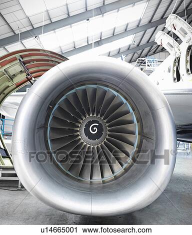 Stock Image - Close up of still jet airplane engine. Fotosearch