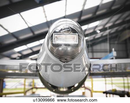Stock Photograph - Close up of tail light of airplane. Fotosearch