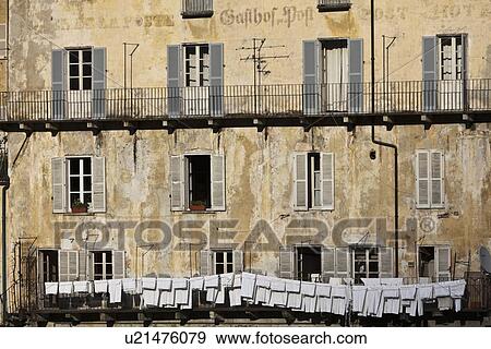 Close up of washing line on old building View Large Photo Image Stock Photo - Close up of washing line on old building. Fotosearch