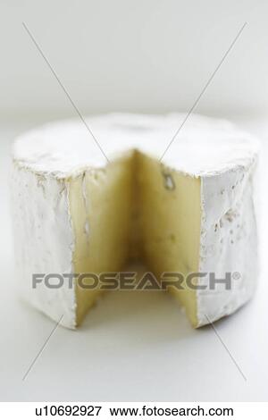 Stock Photo - Close up of wheel of cheese. Fotosearch