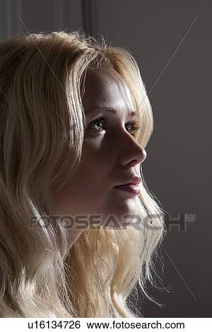 Close up of womans face and hair View Large Photo Image Stock Photograph - Close up of womans face and hair. Fotosearch