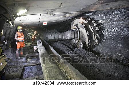 Coal miner working in mine View Large Photo Image Picture - Coal miner working in mine. Fotosearch