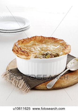 Stock Photography - Dish of baked chicken pie. Fotosearch