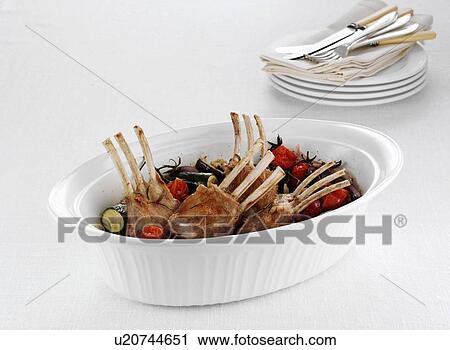 Dish of rack of lamb and vegetables View Large Photo Image Stock Image - Dish of rack of lamb and vegetables. Fotosearch