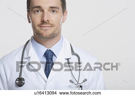 Picture - Doctor wearing stethoscope. Fotosearch