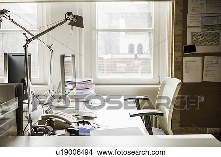Empty desk in office View Large Photo Image Picture - Empty desk in office. Fotosearch