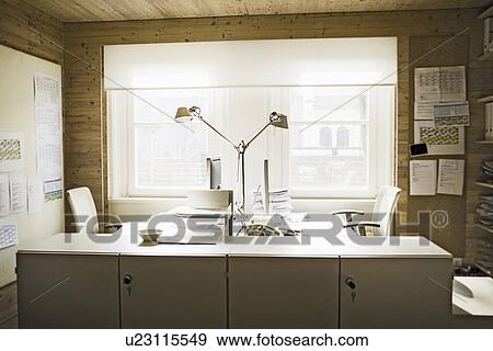 Empty desks in office View Large Photo Image Stock Photo - Empty desks in office. Fotosearch