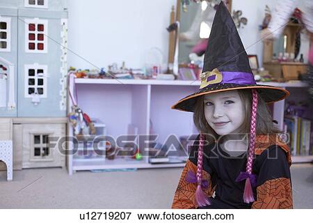 Girl wearing Halloween costume View Large Photo Image Stock Photo - Girl wearing Halloween costume. Fotosearch