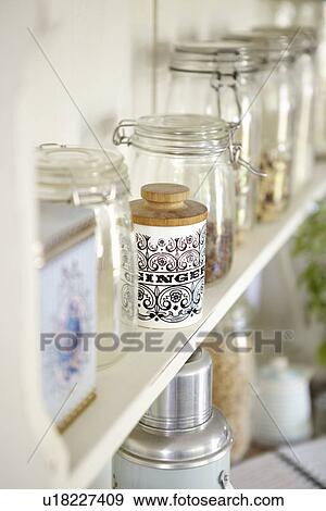 Jars of dried foods on shelf View Large Photo Image Stock Photo - Jars of dried foods on shelf. Fotosearch