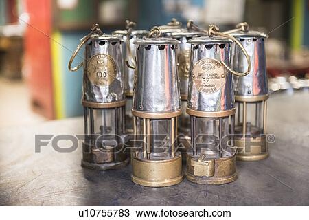 Old fashioned mining lamps on table View Large Photo Image Stock Image - Old fashioned mining lamps on table. Fotosearch