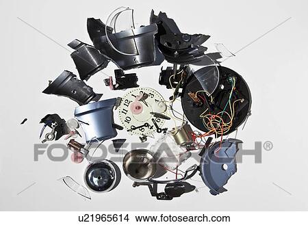 Picture - Pile of smashed clock parts. Fotosearch