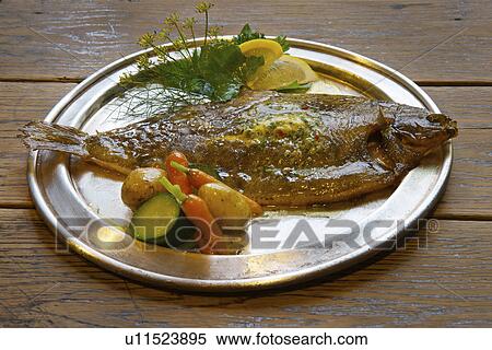 Plate of grilled plaice and vegetables View Large Photo Image Stock Photography - Plate of grilled plaice and vegetables. Fotosearch