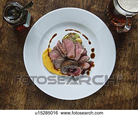 Plate of lamb with kidneys View Large Photo Image Stock Photograph - Plate of lamb with kidneys. Fotosearch